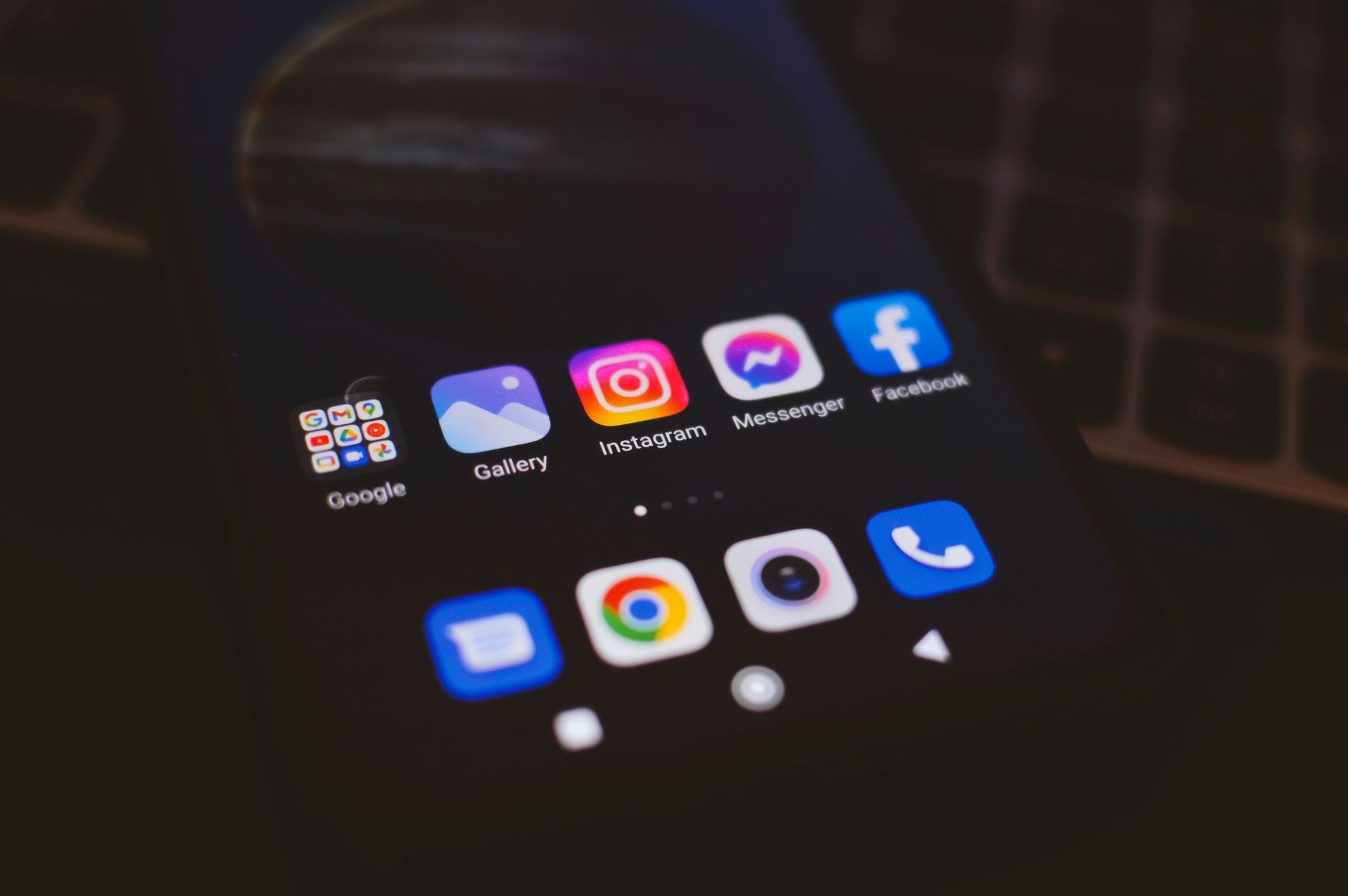 a close up shot of a mobile phone with applications on screen